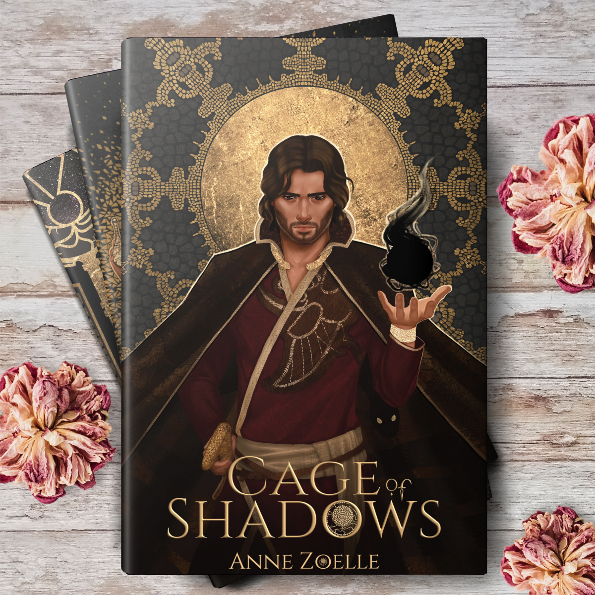 Cage of Shadows book cover on a stack of books